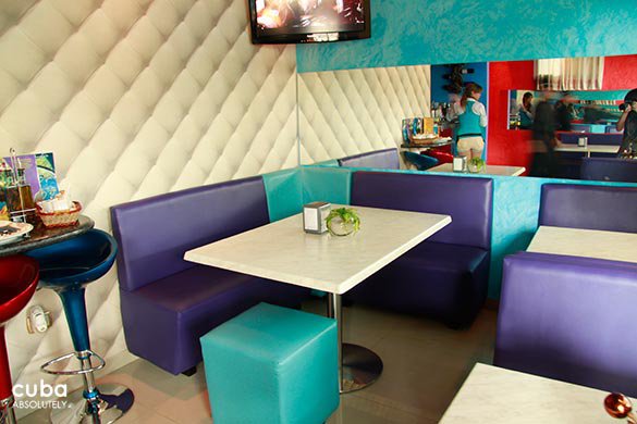 restauirant with blue and violet furnitures © Cuba Absolutely, 2014