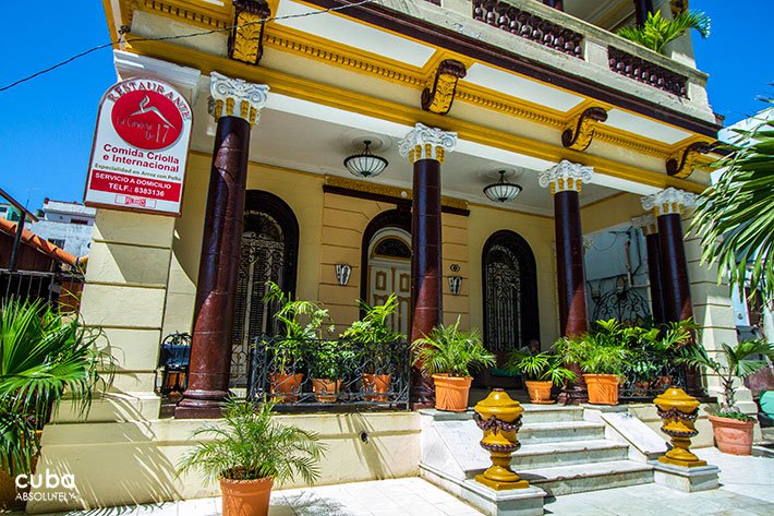 Front of La Casona de 17 restaurant in Vedado, yellow building © Cuba Absolutely, 2014