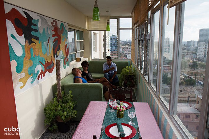 young people sitting on a balcony © Cuba Absolutely, 2014