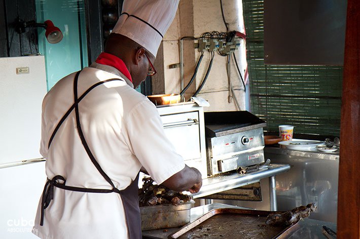 Chef making a dish in the kitchen © Cuba Absolutely, 2014