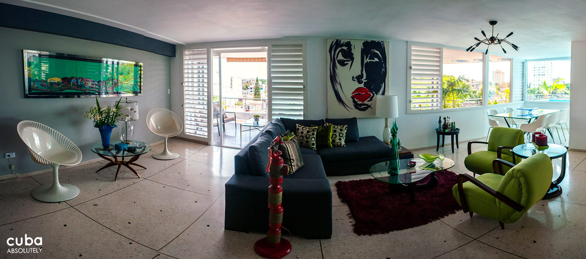 Artedel is a is a super-shiny 1950s style home scattered with contemporary furniture, Murano glass pieces, bronze lamps, and vibrant art work. Havana, Cuba