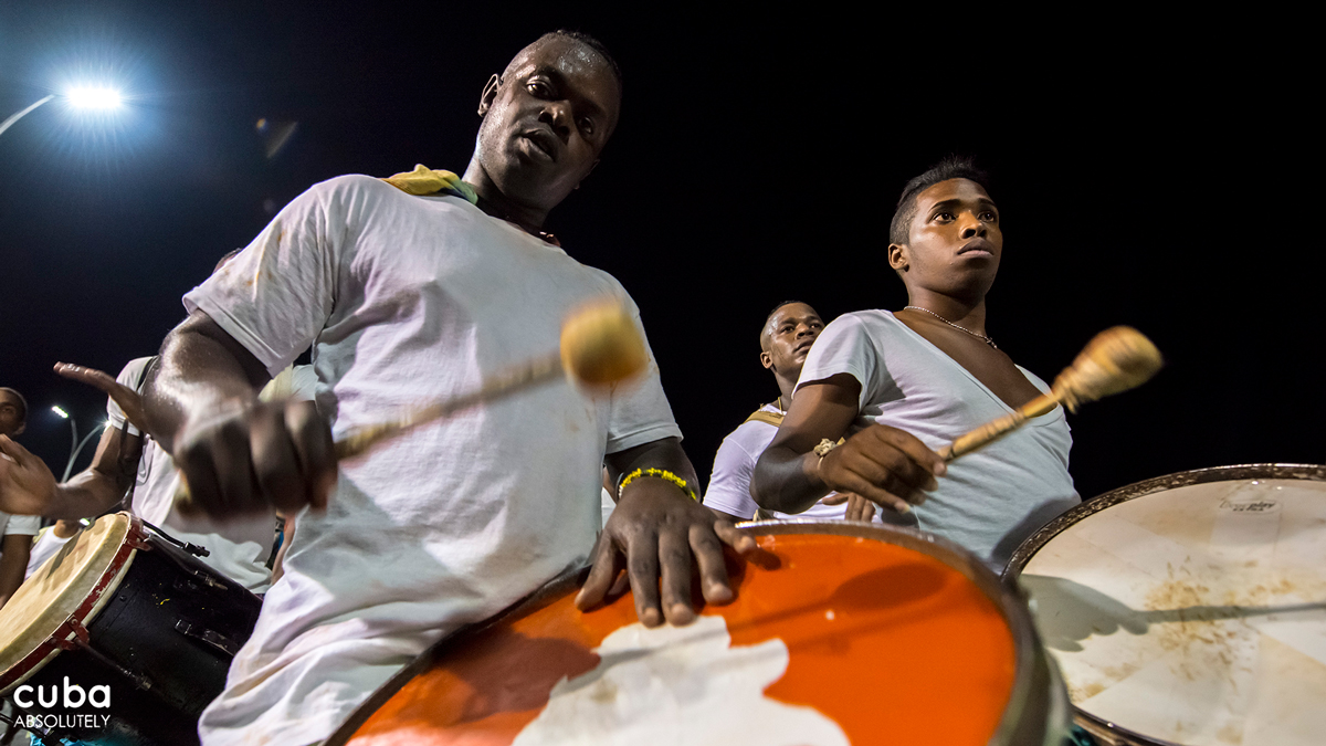 Drums rumble along the Malecón during the festivities. Havana, Cuba