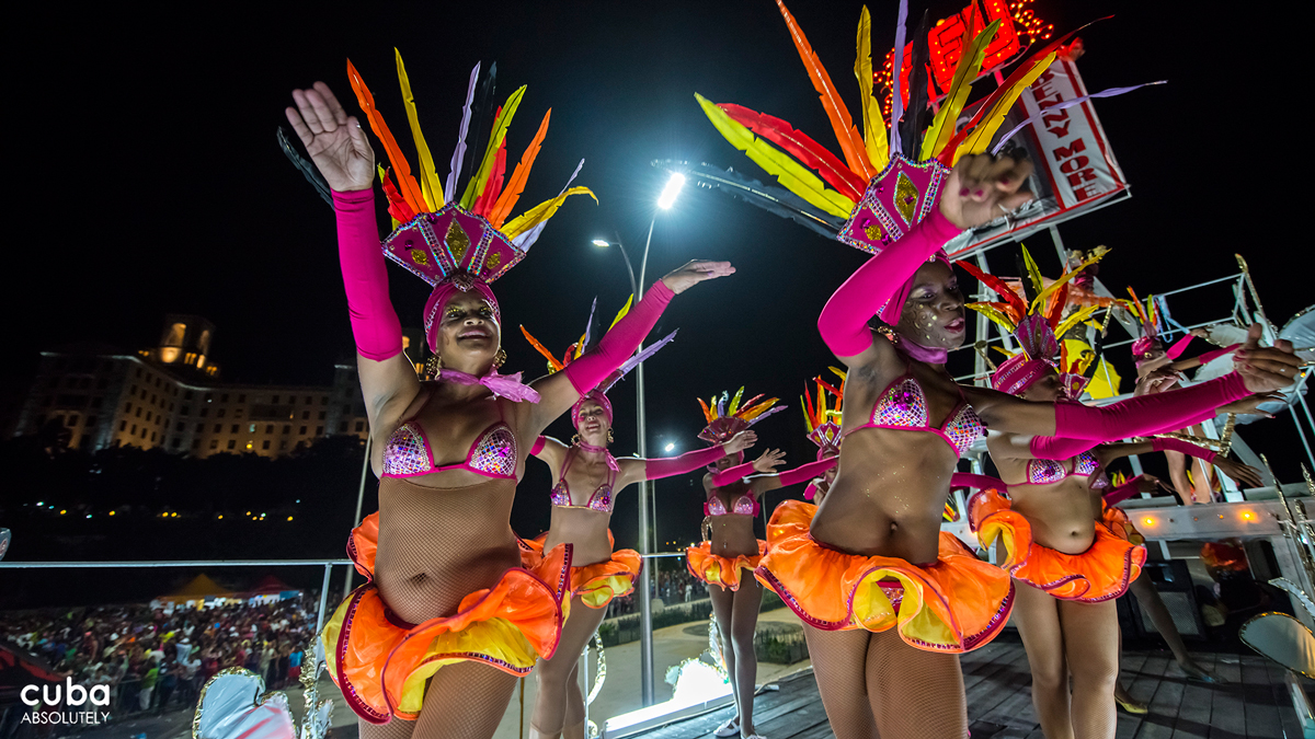 Although they are a far cry from the glory days of their predecessors, floats, comparsas and muñecones still parade down the Malecón from La Punta to the Hotel Nacional every August to the delight of the thousands of revellers who gather on the streets to watch the parade. Havana, Cuba