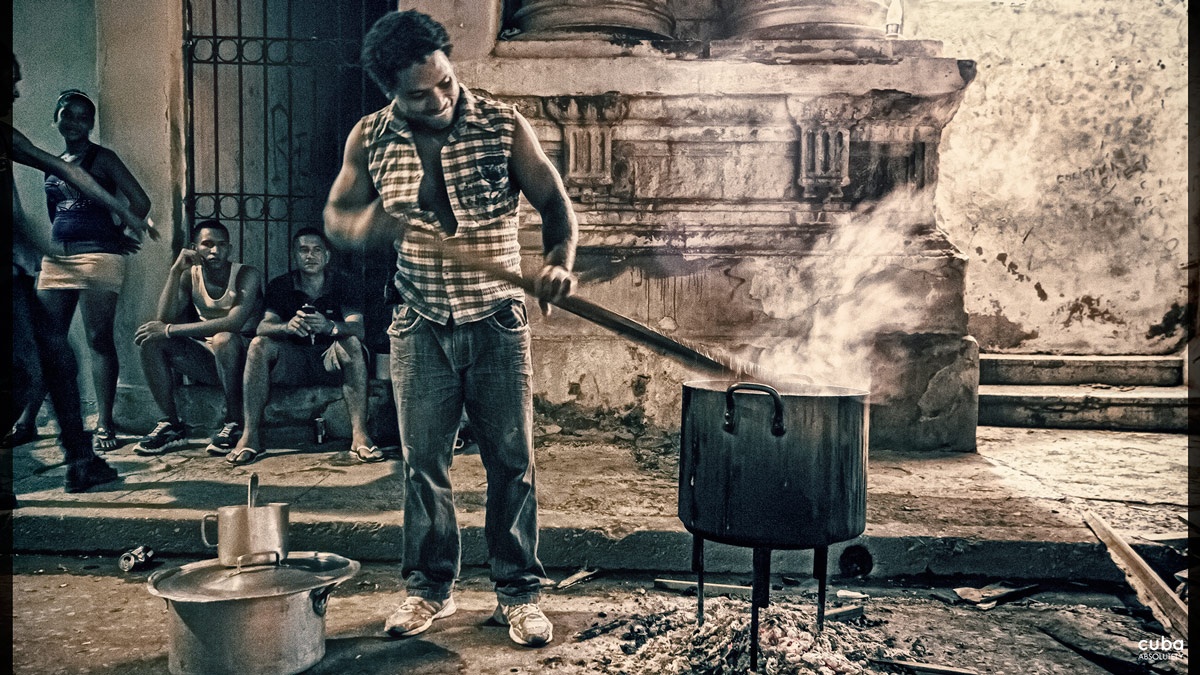 This jumble of meat and vegetables is then cooked in a huge pot outside right on the street. Placing the pot, filling it with the uncooked food, lighting the fire, and taking turns stirring the stew is a ritual in itself. When it’s done, it’s time to start the party. Havana, Cuba